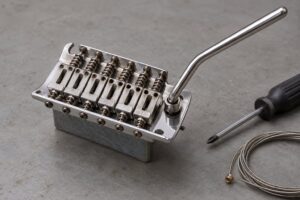 what is a tremolo arm on a guitar